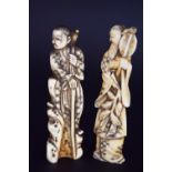 Two 19th century Japanese Meiji-period bone okimono carved in the shape of figures, 10.