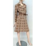 A vintage camel coloured sheepskin jacket with leather trim to edges and pockets together with a