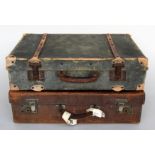 A green 'British Make' fibre and canvas travel case with leather handle and wooden bracing,