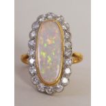 A ladies 18ct gold and white opal dress ring,