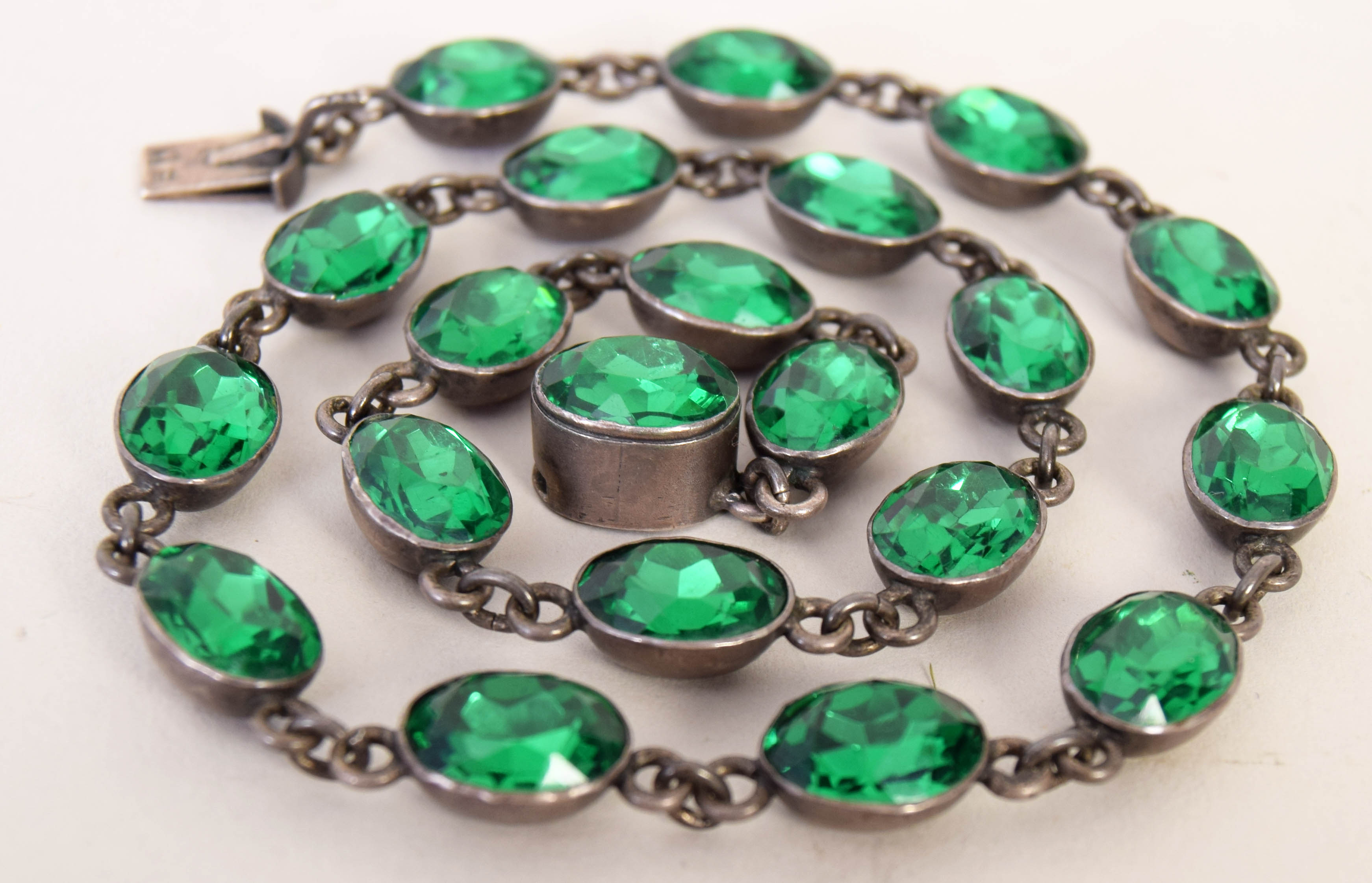 A sterling silver and green paste necklace, marked 825,