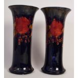 A pair of Moorcroft trumpet shaped vases in the 'Pomegranate' pattern,