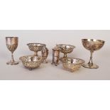 A pair of small pierced silver bonbon dishes on pedestal bases, 7cmH and 9cmW,