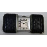 An early 20th century Swiss made Movado Ermeto Chronometre hermetic travel watch,