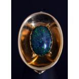 Australian Interest: An Australian 18ct gold and black opal solitaire ring by Rod Edwards,