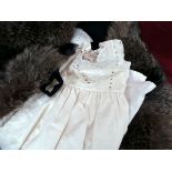 Two fur collars and a handmade Victorian soft cotton nightgown.