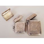Two silver vesta boxes together with a small silver box