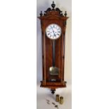 A late 19th century Vienna regulator wall clock,