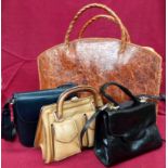 Three vintage handbags and a large skin tote bag.