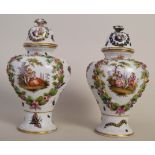 A pair of Meissen style baluster jars and covers, late 19th century, with flower encrusted reserves,