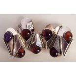 A mid-20th century sterling silver and cabochon amethyst ladies bracelet of hinged geometric form,