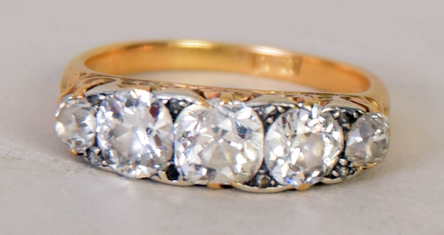 An early 20th century 18ct gold and five stone diamond engagement ring - Image 2 of 2