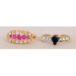 An early to mid 20th century 18ct gold diamond and ruby cluster ring together with a gold black