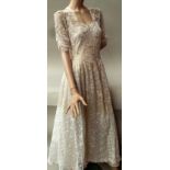 A 1940s ivory lace wedding dress.