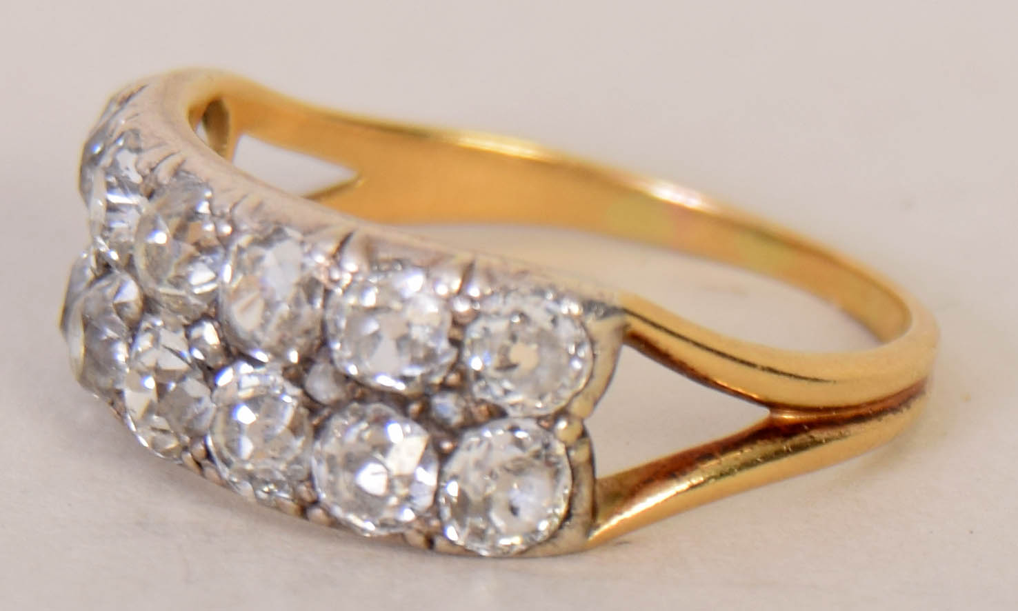 An early 20th century yellow metal and diamond set cluster ring, - Image 2 of 2