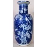 A 19th century Chinese blue and white sleeve vase decorated with prunus 45cmH