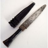 A small dagger, possibly from Southeast Asia, with black leather hilt and scabbard, 20.