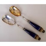 A pair of Doulton Lambeth salad spoons, comprising a serving spoon and fork,