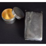An Art Deco sterling silver cigarette case with two eyelets at the top,