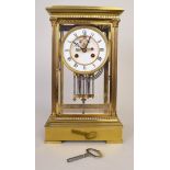 A French four-glass, gilded mantel clock, the 12.