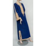 A hand-made Egyptian kaftan in blue silk water tafetta.