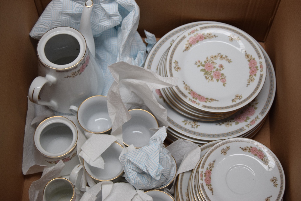 A complete tea set of Crown Ming china, comprising dinner plates, side plates, bowls, saucers,