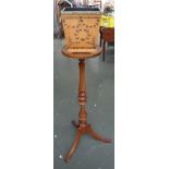 A wooden urn stand on tripod feet 95cmH together with a small wooden paper bin