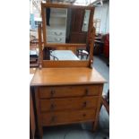 A dressing table with mirror and three drawers below 29 x 132 x 90