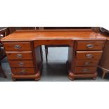 A kneehole desk of four drawers either side 46 x 154 x 78cmH