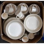 A selection of white ceramics, including bowls, cups and plates,