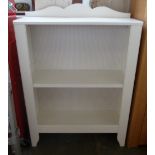 A white painted bookcase with one shelf 70 x 30 x 87cmH