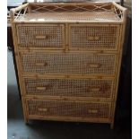 A cane and bamboo chest of five drawers,