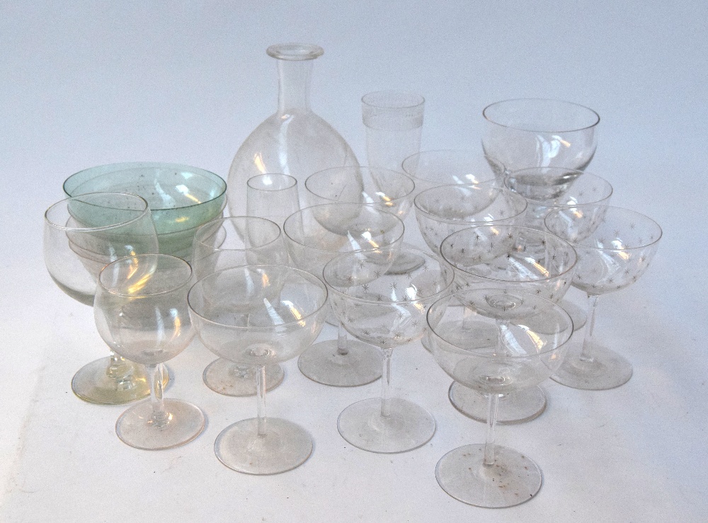 A selection of glass, including champagne and wine glasses, five decorated with stars,