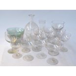 A selection of glass, including champagne and wine glasses, five decorated with stars,
