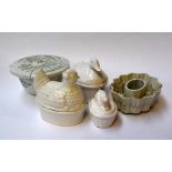 Three small tureens with lids shaped as chickenn, duck, and rabbit, a ceramic jelly mold,
