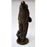 A cold cast bronze statue of a clown with a lute and a cat 80cmH