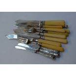 A selection of silver cutlery: 6 fish knives, 4 forks,