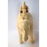 A white ceramic figure of elephant,