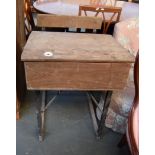A vintage school desk with original ceramic ink well reading 'Bennet Furnishing Co LTD London &