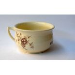 A decorated ceramic chamber pot 23cmD