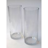 Two large glass cylindrical vases,