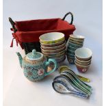 A mixed selection of oriental ceramics including:a teapot,12 tea cups,