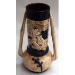 A Bretby Art pottery oriental twin handle lizard vase,