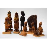 A collection of African and Indian wooden figurines,