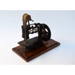 1869 miniature hand sewing machine,