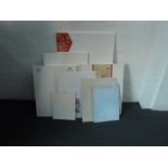 A selection of four canvases and six painting boards