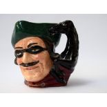 A Royal Doulton character jug of Dick Turpin with Black Bess as the handle 19cmH