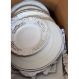 A selection of white porcelain, to include a set of thirteen plates white cut out pattern,