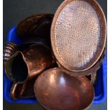 A selection of copper items including an alligator skin pattern tray