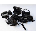 A quantity of cameras including an Olympus Trip 35, a Polaroid 636 Closeup, an Agfamatic 1008,